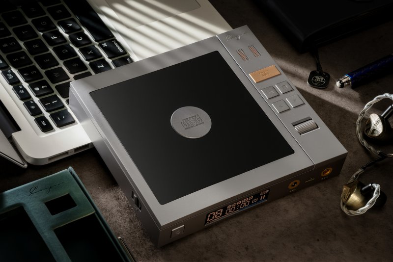 Cayin CP6 portable tube CD player, on a desk, angled