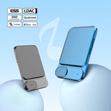Khadas Tea magnetic DAC and headphone amp, grey and blue with a phone