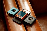 Shanling Onix Tocata XM2 leather case, on a wooden table
