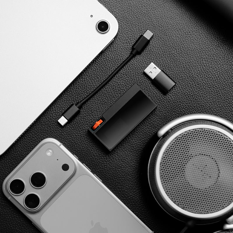 Shanling UA6 II USB DAC and headphone amp, with a phone and headphones