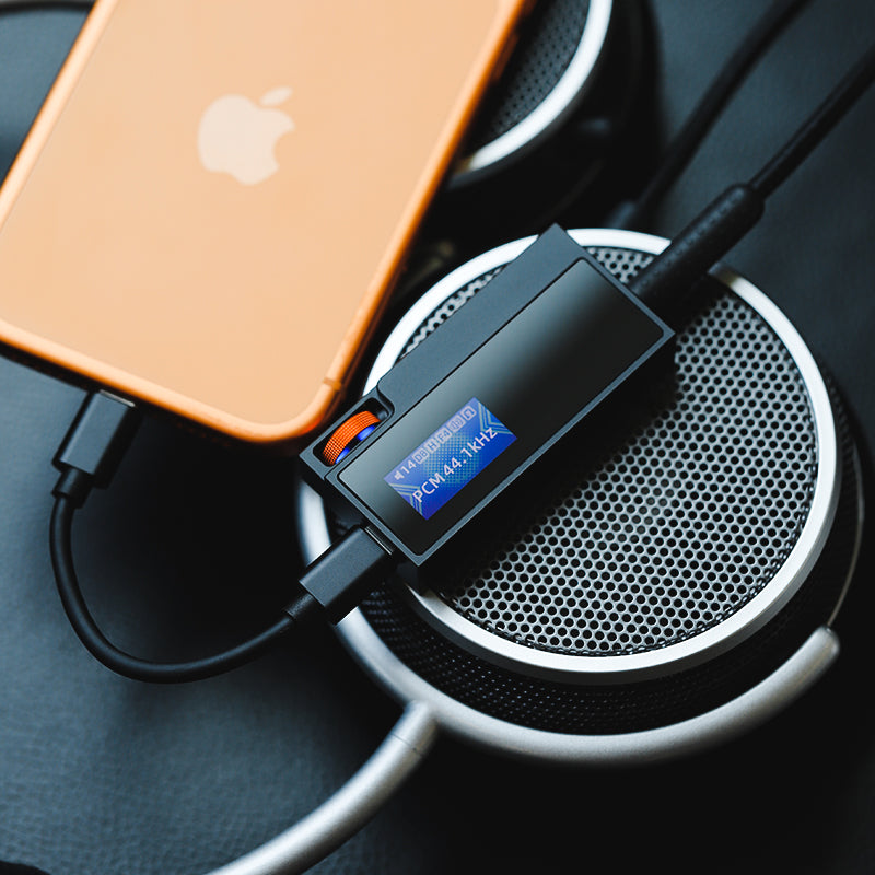 Shanling UA6 II USB DAC and headphone amp, connected to a phone
