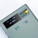 Cayin RU9 portable DAC and headphone amp, display and volume wheel close-up