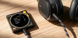 FiiO TRUST LT-3.5 USB-C to 3.5 mm DAC cable, in use with a player and headphones