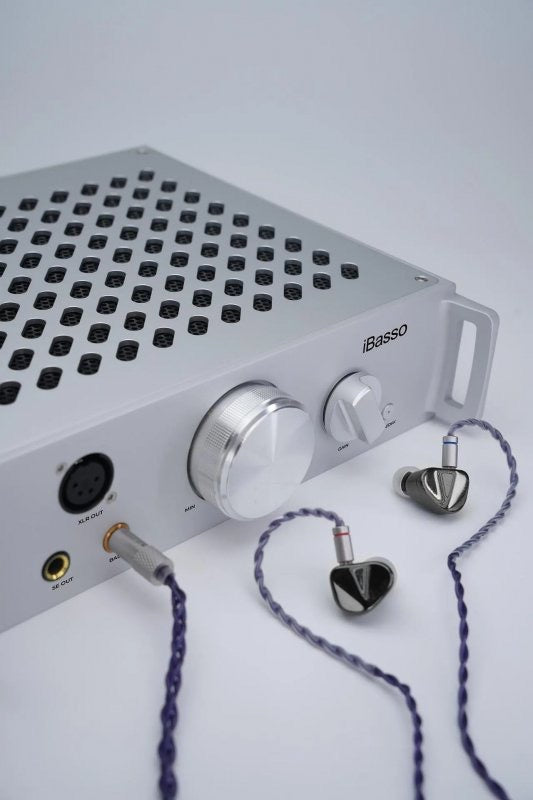 iBasso Kunlun GaN desktop headphone amp, front with earphones