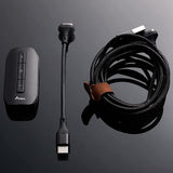 IKKO Zerda ITM01 USB DAC and headphone amp, with its cable on a dark background