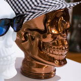 AMP3 glass skull headphone stand, copper, with hat and sunglasses