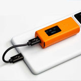 Cayin RU6 leather case, orange, in use with cable and phone